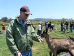 2009 May Pescadero 23 Harley Farms Dave with baby goat.JPG