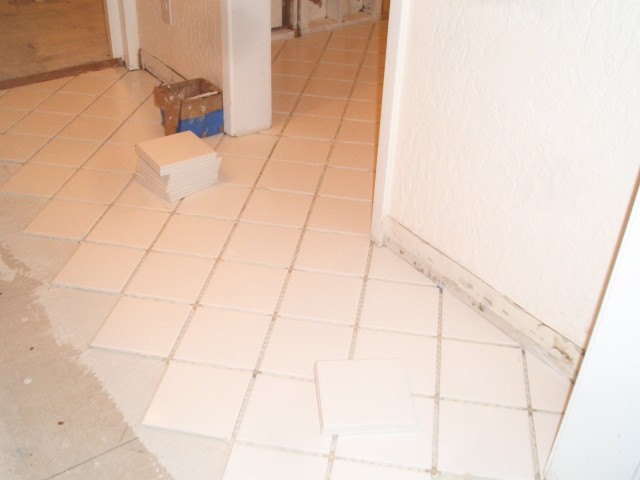 Water Damage Repair 09-Oct-06 closet-vanity tile 04.jpg
