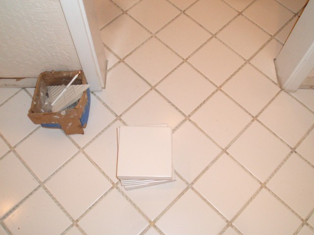 Water Damage Repair 09-Oct-06 closet-vanity tile 05.jpg