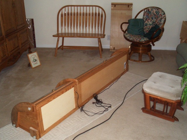 Water damage Aug 5th welcome home 03 great room curio on living room floor.jpg