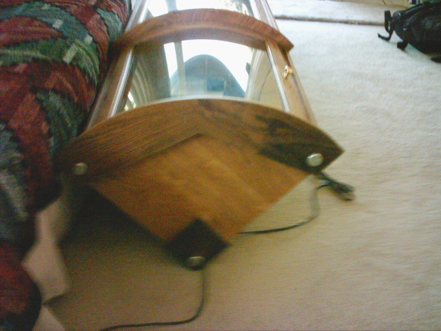 Water damage July 29 bedroom corner curio.JPG