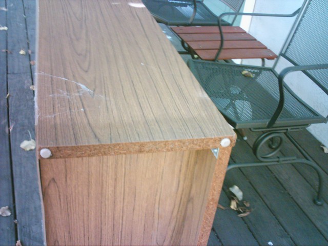 Water damage July 29 bookcase.JPG