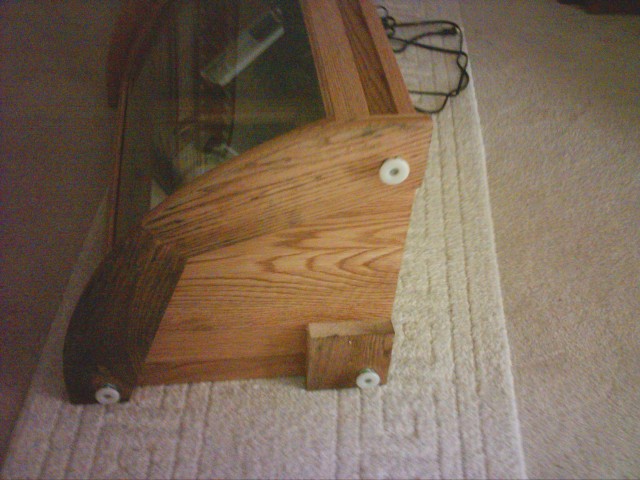 Water damage July 29 great room corner curio.JPG