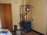 Oct 2007 Cody 9-11 Megan's house utility rm base board heating system.JPG