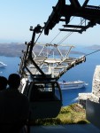 09Aug20 Santorini 12 funicular station cars arriving for us to go down.JPG