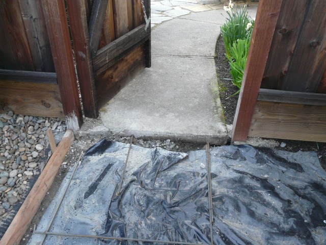 2010 Mar 14 San Ramon 11 Concrete rebar attached to existing walkway.JPG