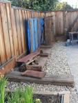 2010 June 15th 01 deconstructing firewood shelter.JPG
