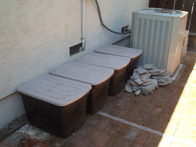 2005 August 27 yard leftovers 09 3.5 bins small river rock.jpg