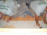 2005 August 29 Conversation Pit Installation 06 bench #1 trim the floor.jpg