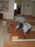 2005 August 29 Conversation Pit Day 2 Installation 03 installing stairs.jpg
