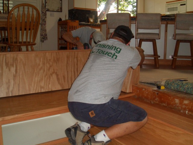 2005 August 29 Conversation Pit Day 2 Installation 07 install back rest.jpg
