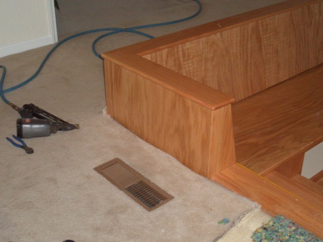 2005 August 29 Conversation Pit Day 2 Installation 11 back side of back rest, end plate and top stair tread.jpg