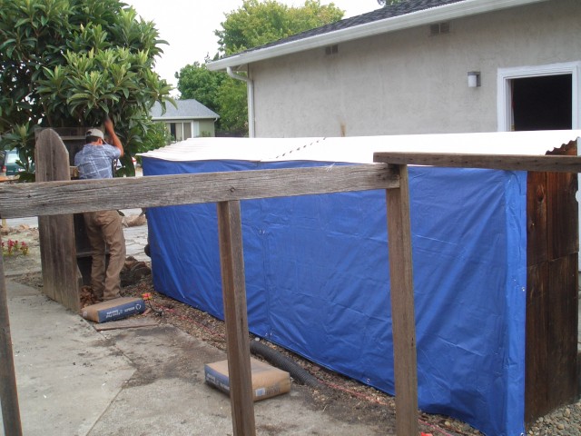 2005 Sep 12 fence 08 demolition complete new tarp on woodpile.jpg