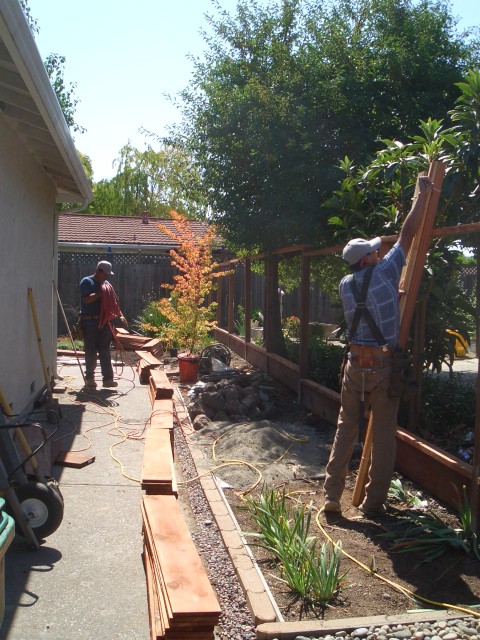 2005 Sep 12 fence 34 getting 1x1 set out.jpg