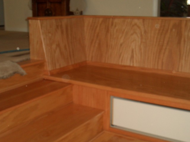 2005 Sep 12 Conversation Pit Day 3 Installation 02 bench back trim in place.jpg