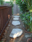 2005 Sep 6 yard update back - begin new path leftover flagstones.jpg